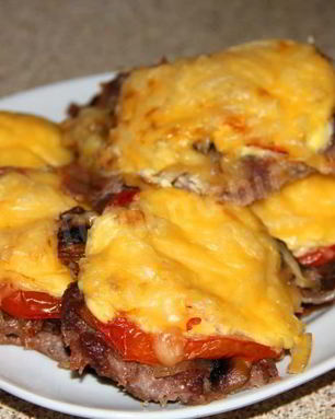 Мясо по-французски с фаршем грибами и помидорами