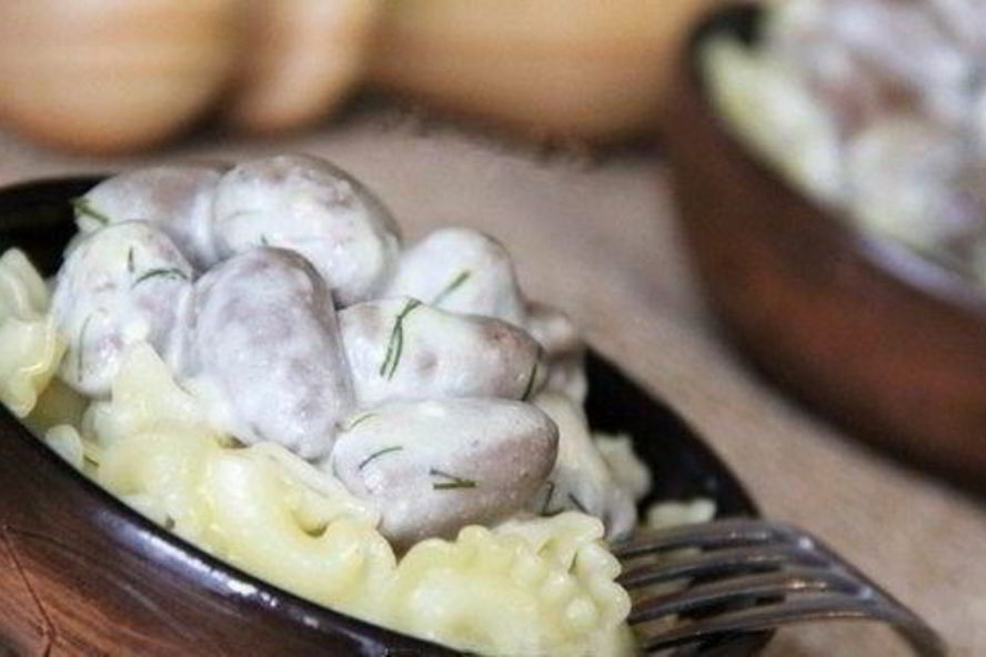 Рецепт куриных сердечек в сырном соусе