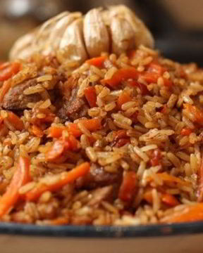 Плов из бурого риса со свининой