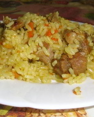 Рассыпчатый плов из свинины