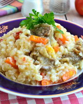 Рисовая каша со свининой и овощами в мультиварке