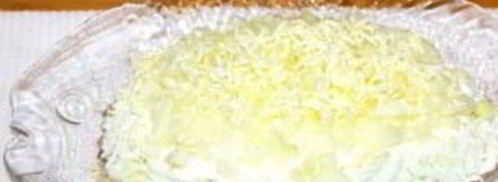 салат мимоза с маслом. Шаг 6